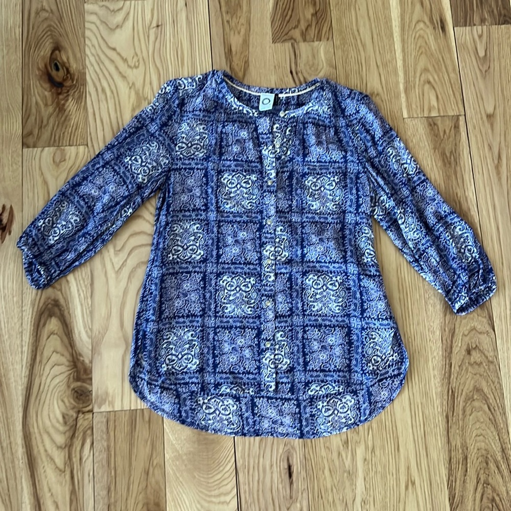 Purple and cream patterned blouse from Anthropologie. Cropped blousy sleeves.